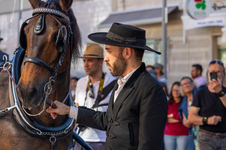 SAO BRAS DE ALPORTE, PORTUGAL - 4th MAY 2024: Period representation event of Carriage coupling traditional event with beautiful carriages with horses and person dressed for the occasion.のeditorial素材