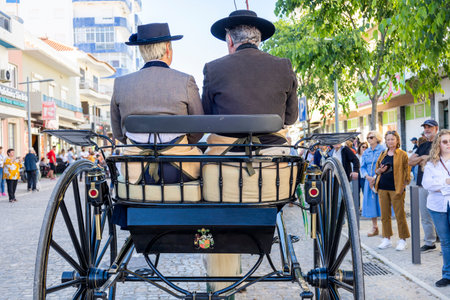 SAO BRAS DE ALPORTE, PORTUGAL - 4th MAY 2024: Period representation event of Carriage coupling traditional event with beautiful carriages with horses and person dressed for the occasion.のeditorial素材