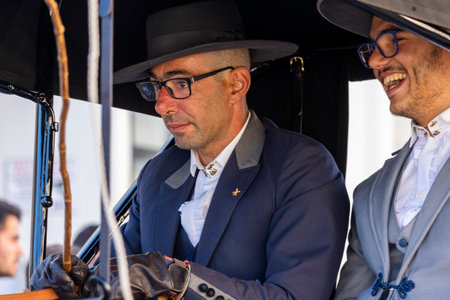 SAO BRAS DE ALPORTE, PORTUGAL - 4th MAY 2024: Period representation event of Carriage coupling traditional event with beautiful carriages with horses and person dressed for the occasion.のeditorial素材