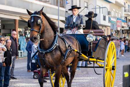 SAO BRAS DE ALPORTE, PORTUGAL - 4th MAY 2024: Period representation event of Carriage coupling traditional event with beautiful carriages with horses and person dressed for the occasion.のeditorial素材