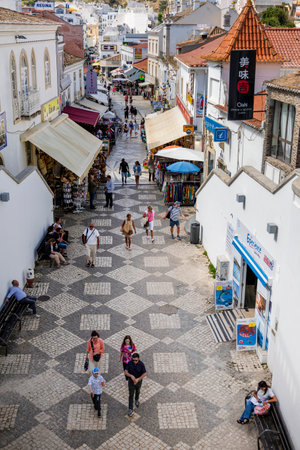 ALBUFEIRA, PORTUGAL - 7th MAY 2024: Traditional portuguese architecture of houses in the region of Albufeira, Portugal.のeditorial素材