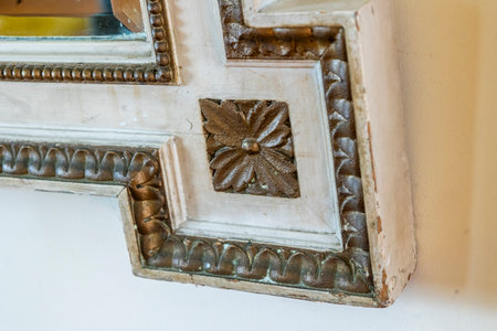 Close view detail of a weathered Frame detail of vintage mirror.の写真素材