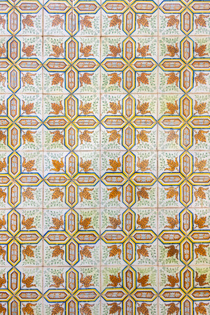 Typical azulejo artwork of Portugal. Typical details of azulejo ceramics artwork located in the...
