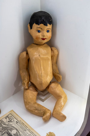 old vintage children puppet at display on a museum.の写真素材