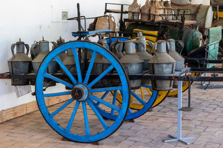 SAO BRAS DE ALPORTEL, PORTUGAL - 6th MAY 2024: Close view of several types of coaches and carriages in a well preserved exhibit.のeditorial素材