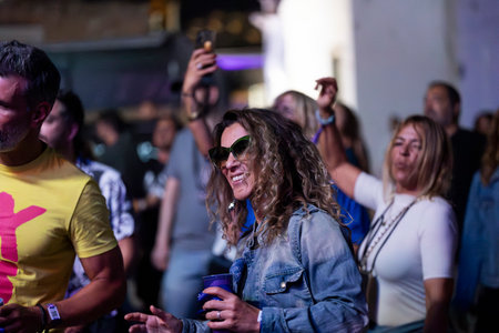 FARO, PORTUGAL: 5th SEPTEMBER, 2024 - Audience watch music artist in the Music Festival F, a big festival on the city of Faro, Portugalのeditorial素材