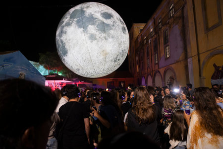 FARO, PORTUGAL: 5th SEPTEMBER, 2024 - Audience enjoying music in headphones on Festival F, a silent disco concept.のeditorial素材