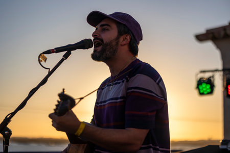 FARO, PORTUGAL: 6th SEPTEMBER, 2024 - Music artist, Romeu Bairos, performs on Festival F, a big festival on the city of Faro, Portugal.のeditorial素材