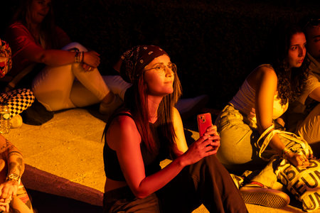 FARO, PORTUGAL: 5th SEPTEMBER, 2024 - Audience watch music artist in the Music Festival F, a big festival on the city of Faro, Portugalのeditorial素材