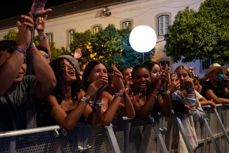 FARO, PORTUGAL: 5th SEPTEMBER, 2024 - Audience watch music artist in the Music Festival F, a big festival on the city of Faro, Portugalのeditorial素材