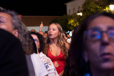 FARO, PORTUGAL: 7th SEPTEMBER, 2024 - Audience watch music artist in the Music Festival F, a big festival on the city of Faro, Portugalのeditorial素材