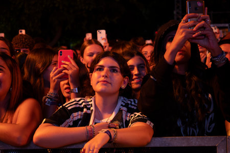 FARO, PORTUGAL: 7th SEPTEMBER, 2024 - Audience watch music artist in the Music Festival F, a big festival on the city of Faro, Portugalのeditorial素材