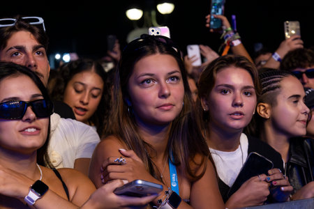 FARO, PORTUGAL: 7th SEPTEMBER, 2024 - Audience watch music artist in the Music Festival F, a big festival on the city of Faro, Portugalのeditorial素材