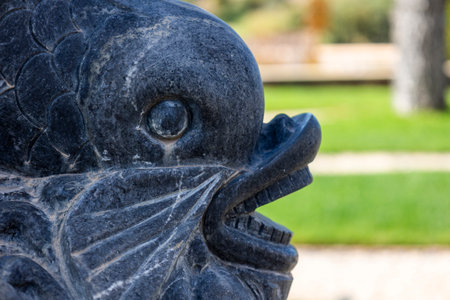 ESTOMBAR, PORTUGAL - 5th OCOTOBER 2024: Artistic stone modern contemporary fish statues located on wine estate "Quinta dos Vales".のeditorial素材