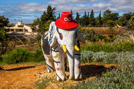 ESTOMBAR, PORTUGAL - 5th OCOTOBER 2024: Artistic plaster modern contemporary elephant statues located on wine estate "Quinta dos Vales".のeditorial素材
