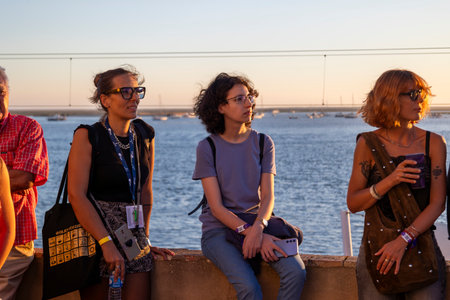 FARO, PORTUGAL: 5th SEPTEMBER, 2024 - Audience watch music artist in the Music Festival F, a big festival on the city of Faro, Portugalのeditorial素材