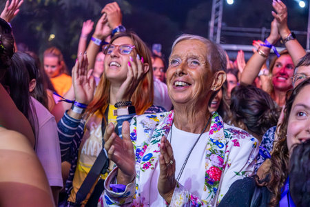 FARO, PORTUGAL: 5th SEPTEMBER, 2024 - Audience watch music artist in the Music Festival F, a big festival on the city of Faro, Portugalのeditorial素材