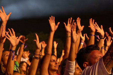 FARO, PORTUGAL: 5th SEPTEMBER, 2024 - Audience watch music artist in the Music Festival F, a big festival on the city of Faro, Portugalのeditorial素材