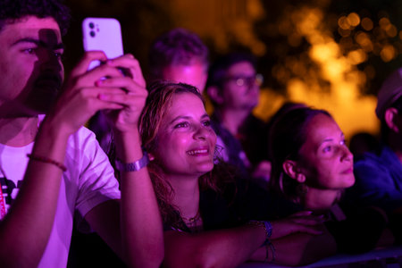 FARO, PORTUGAL: 5th SEPTEMBER, 2024 - Audience watch music artist in the Music Festival F, a big festival on the city of Faro, Portugalのeditorial素材