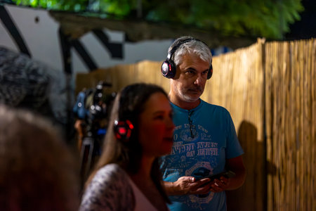 FARO, PORTUGAL: 5th SEPTEMBER, 2024 - Audience enjoying music in headphones on Festival F, a silent disco concept.のeditorial素材