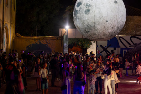 FARO, PORTUGAL: 5th SEPTEMBER, 2024 - Audience enjoying music in headphones on Festival F, a silent disco concept.のeditorial素材
