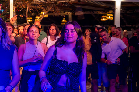 FARO, PORTUGAL: 5th SEPTEMBER, 2024 - Audience watch music artist in the Music Festival F, a big festival on the city of Faro, Portugalのeditorial素材