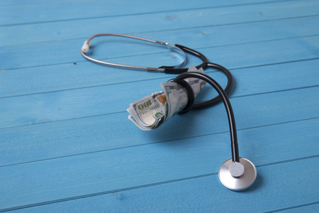 stethoscope and dollarsの写真素材