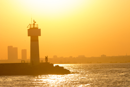 sun and lighthouseの写真素材