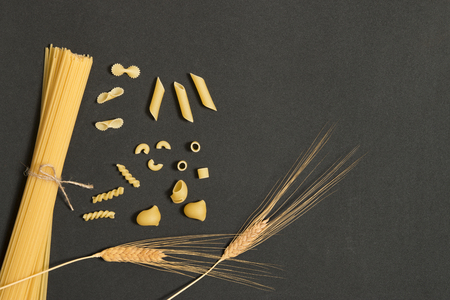 wheat spike and pasta backgroundの写真素材