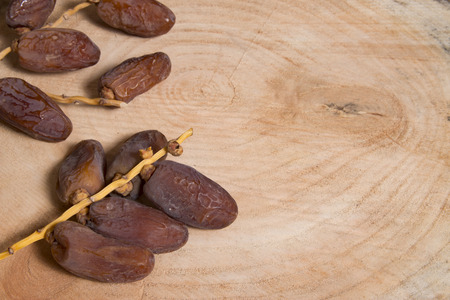 palm fruit on woodの写真素材