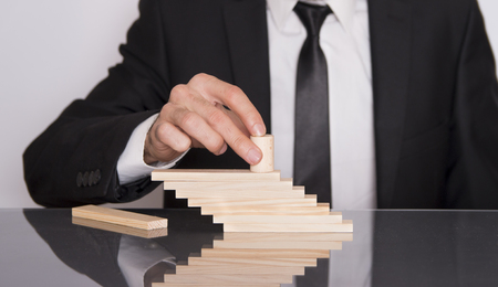 boss puts the cube on topの写真素材