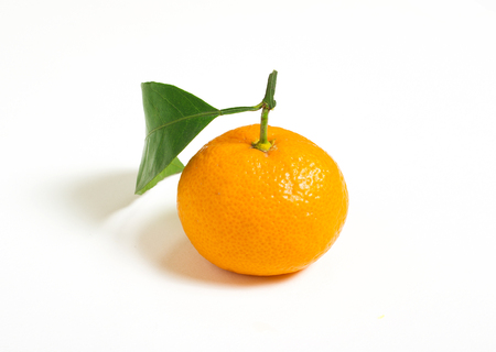 isolated orange with green leafの写真素材