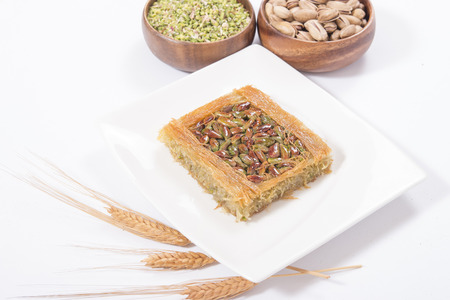 turkish kadayif slice with pistachio on plate