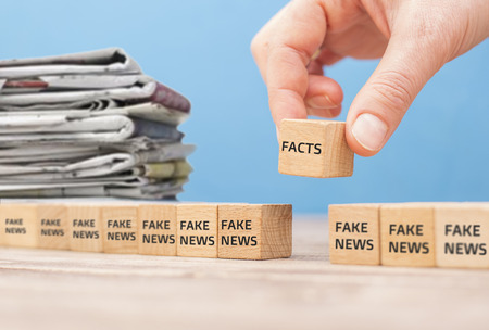 editor chooses fact news from fake newsの写真素材