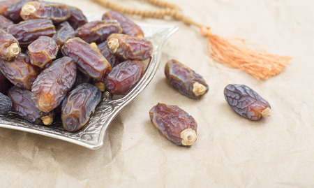 Palm tray and rosary for Ramadanの写真素材