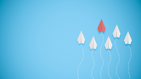 competition concept with paper planes on blue backgroundの写真素材