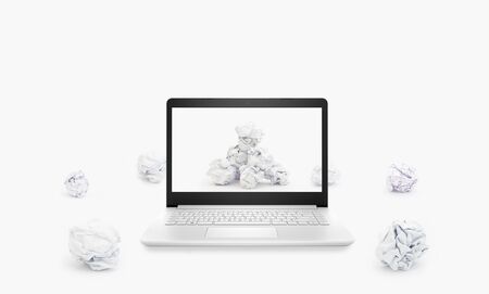 crumpled paper balls carry out through the screenの写真素材