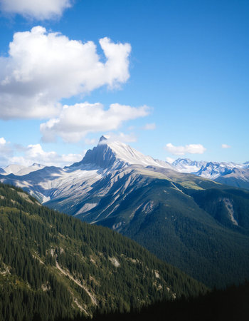 Mountain landscape with snow and clear blue sky in summer day.