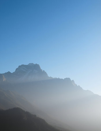 Mountain landscape with fog in the morning, Dolomites, Italyの写真素材