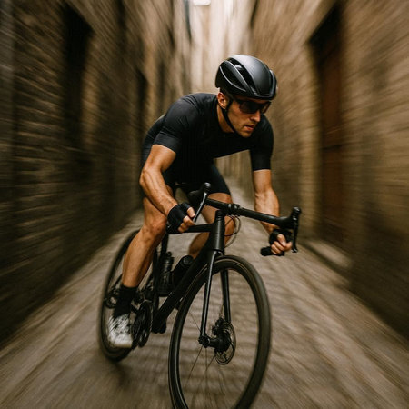 Cyclist Riding a Bike in an Urban Tunnel. Extreme Sport Concept.
