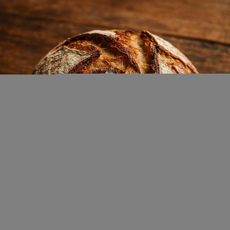 Freshly baked bread on wooden table. Top view with copy space.の写真素材