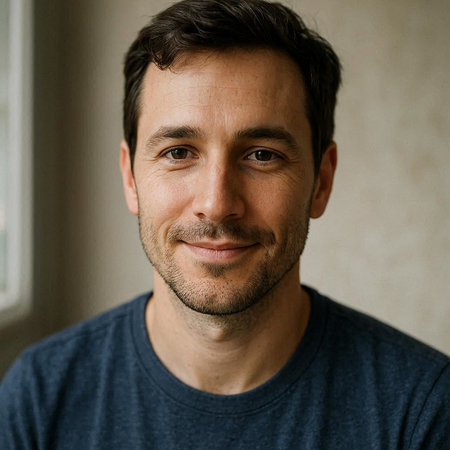 Portrait of a handsome young man smiling and looking at the camera