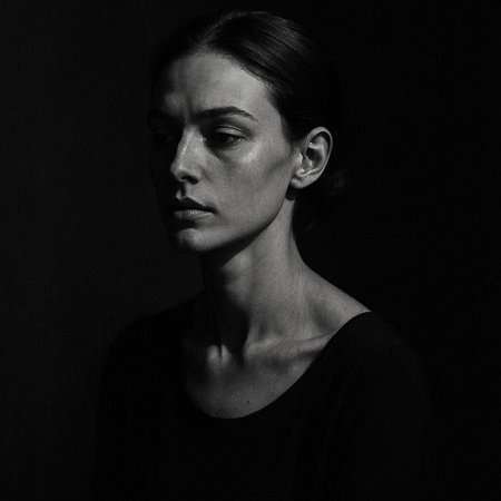 Portrait of a beautiful young woman. Black and white photo.