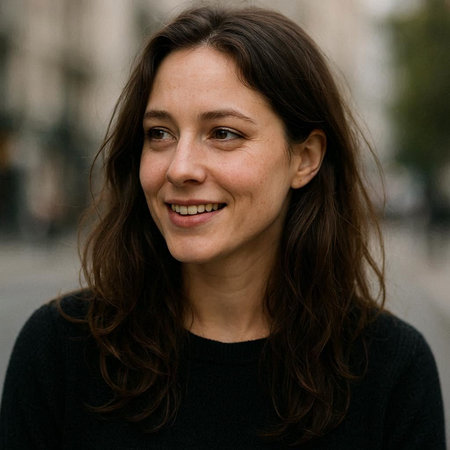 Portrait of a beautiful young woman in a black sweater on the streetの写真素材