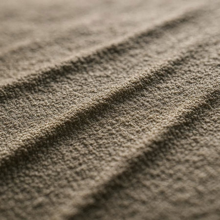 Closeup detail of beige fabric texture background. Vertical shot.