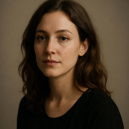 Portrait of a young woman with long brown hair. Studio shot.