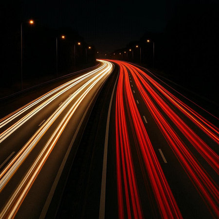 Car light trails on the road at night. Long exposure photo.