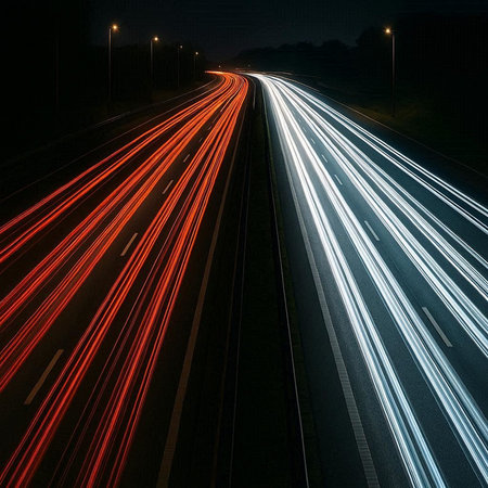 car light trails on the road at night. long exposure photo.