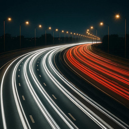 Car light trails on the road at night. Concept of speed and motion.