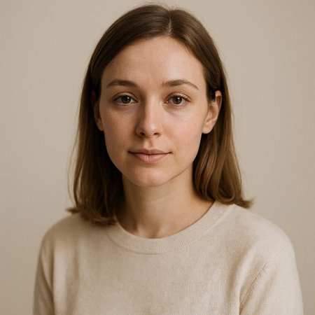 Portrait of a young woman with freckles on her face